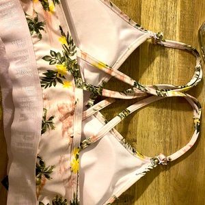 light pink sport bra with plam trees